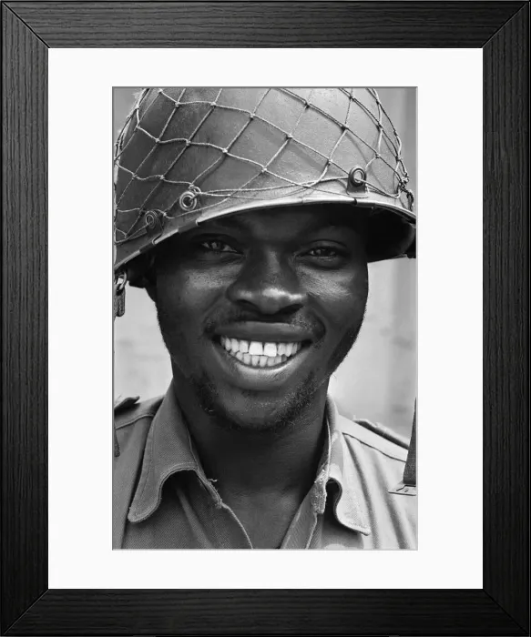 Framed Print : A smiling Biafran soldier seen here during the Biafran conlict