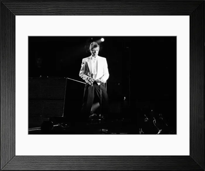 Framed Print : David Bowie on stage at the Birmingham NEC. The concert is part of Framed Print : David Bowie on stage at the Birmingham NEC. The concert is part of