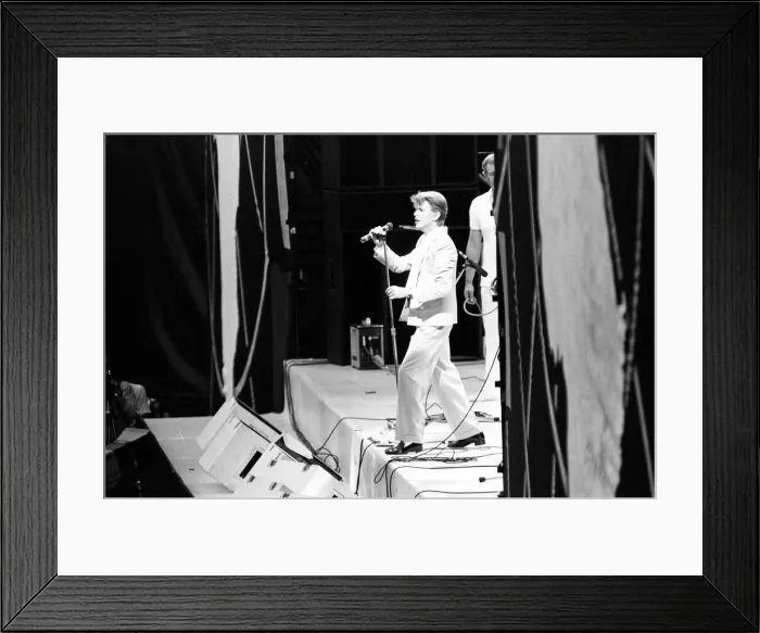 Framed Print : David Bowie on stage at Live Aid, Wembley Arena, London Framed Print : David Bowie on stage at Live Aid, Wembley Arena, London