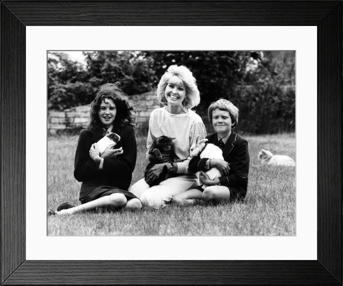 Framed Print : Television presenter Cathy Secker with Jane, David, a guinea pig, cat and rabbit Framed Print : Television presenter Cathy Secker with Jane, David, a guinea pig, cat and rabbit
