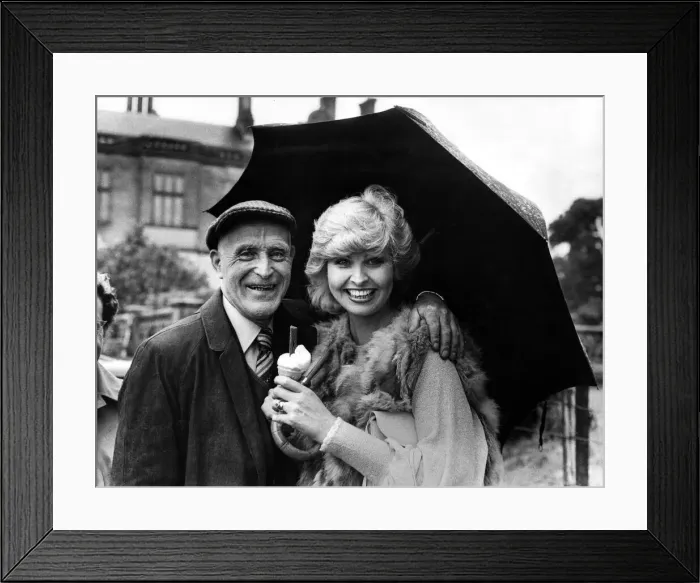 Framed Print : Matfen Hall fete, Tyne Tees announcer Cathy Secker gets a hug Framed Print : Matfen Hall fete, Tyne Tees announcer Cathy Secker gets a hug