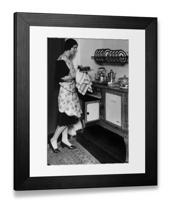 Framed Print : Housewife with her new Flecthers Queensday New World gas regulator oven and hob