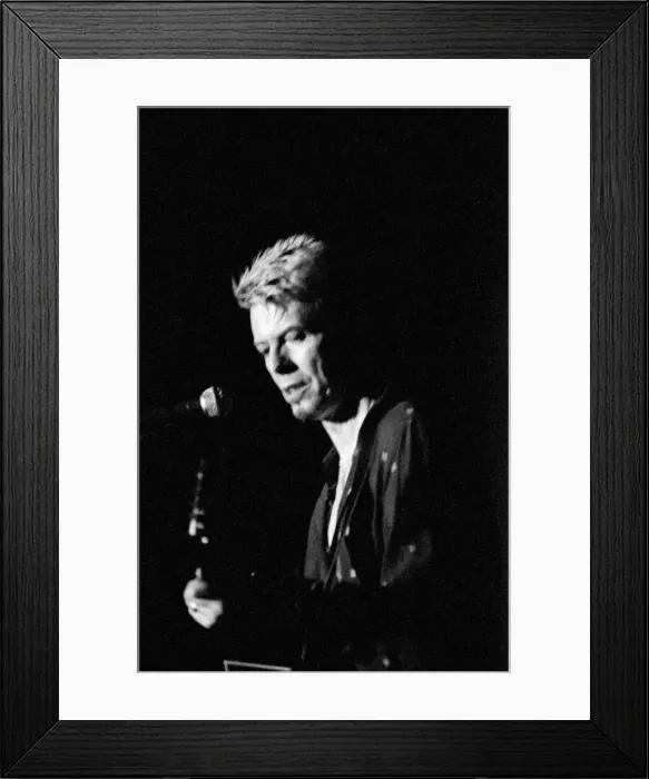 Framed Print : Pop star David Bowie performing on stage during a concert at The Barrowlands in Glasgow