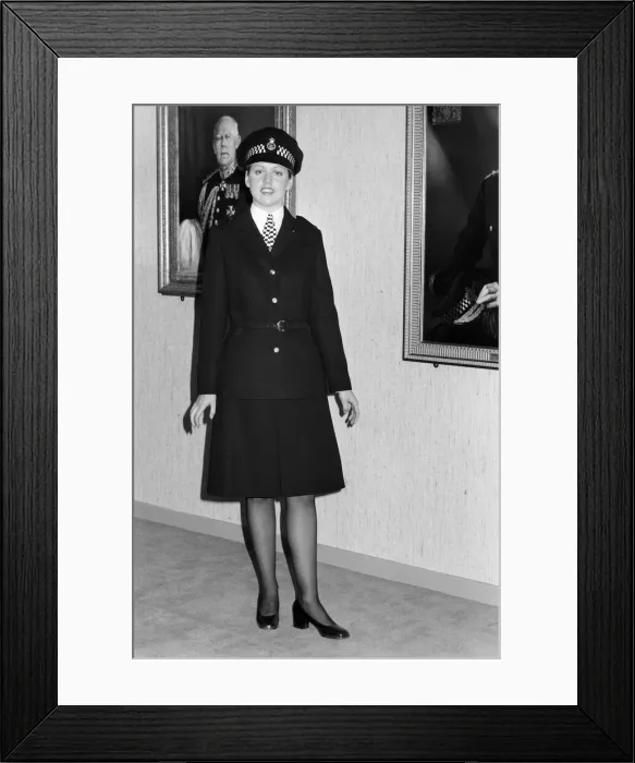 Framed Print : The new Police image. W. P. C Leslie Cosburn, left, (21) from Bow shows off the stylish new