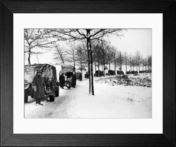 Framed Print : Miles of transport forge ahead through the snow covered grounds of the Ardennes salient Framed Print : Miles of transport forge ahead through the snow covered grounds of the Ardennes salient