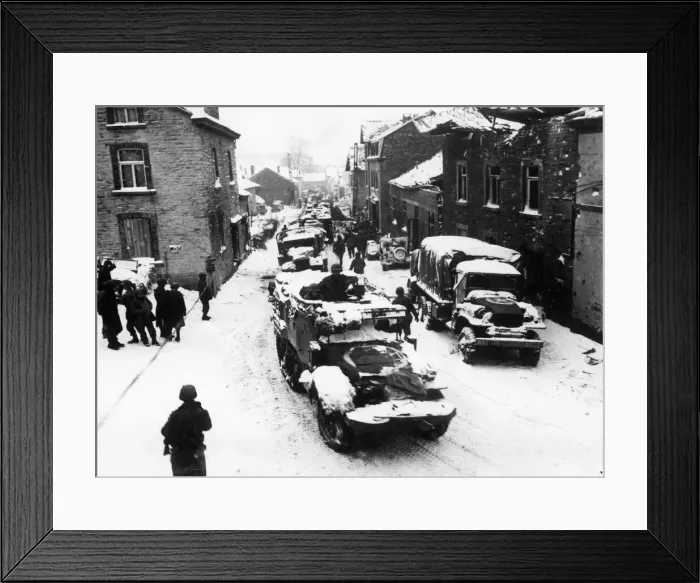 Framed Print : American tanks and infantrymen on their way up to the front pass through the street of Framed Print : American tanks and infantrymen on their way up to the front pass through the street of