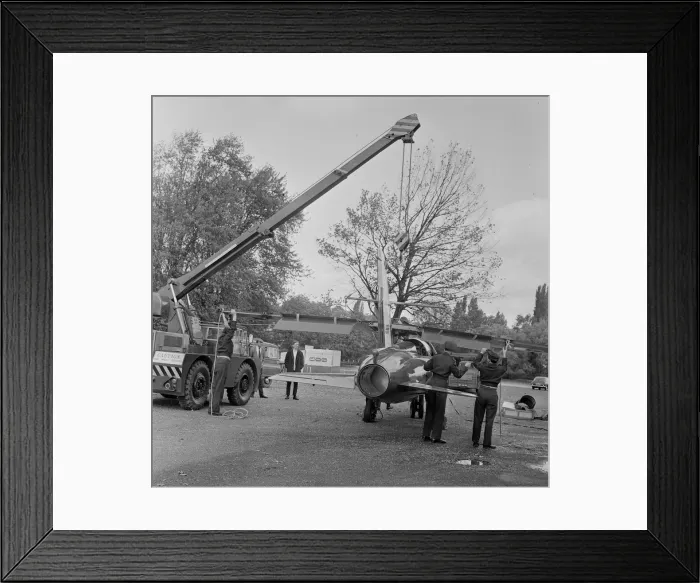 Framed Print : The wings being attached to a Folland Gnat of the Red Arrows in preparation for a Royal Framed Print : The wings being attached to a Folland Gnat of the Red Arrows in preparation for a Royal