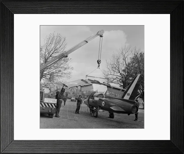 Framed Print : The wings being attached to a Folland Gnat of the Red Arrows in preparation for a Royal