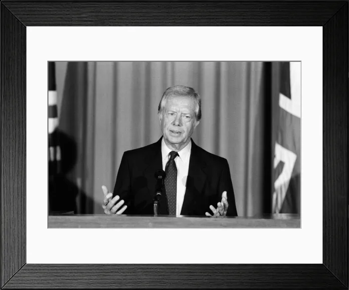 Framed Print : Former President Jimmy Carter talks to the press at the American Embassy on overseas Framed Print : Former President Jimmy Carter talks to the press at the American Embassy on overseas