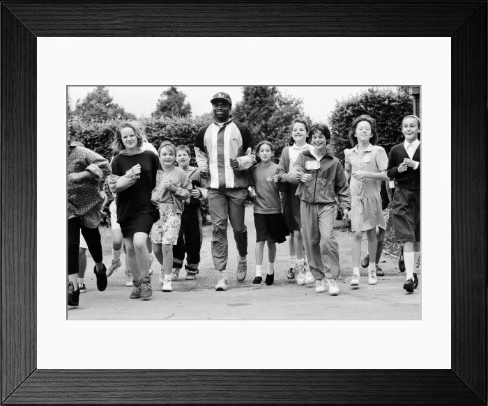 Framed Print : Kriss Akabusi at Geoffrey Field School, Reading. 8th July 1991 Framed Print : Kriss Akabusi at Geoffrey Field School, Reading. 8th July 1991