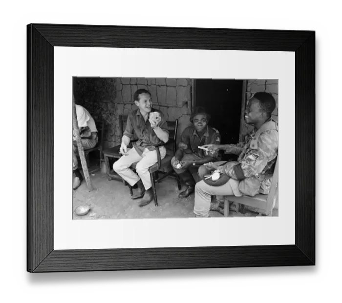 Framed Print : A Biafran officer seen here with Daily Herald staff photographer Ron Burton (left Framed Print : A Biafran officer seen here with Daily Herald staff photographer Ron Burton (left