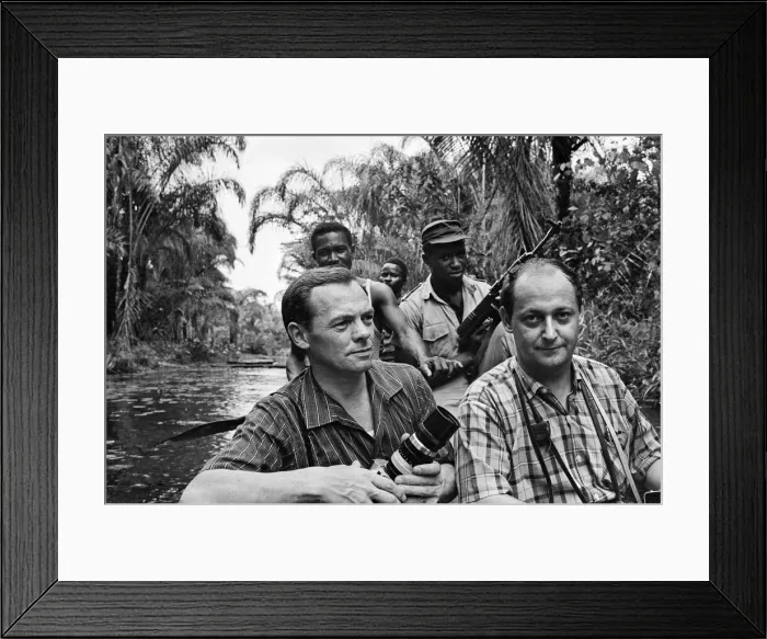Framed Print : Biafran soldiers seen here crossing the river ina canoe with Daily Herald staff Framed Print : Biafran soldiers seen here crossing the river ina canoe with Daily Herald staff