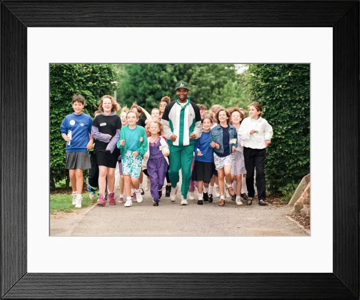 Framed Print : Kriss Akabusi at Geoffrey Field School, Reading. 8th July 1991 Framed Print : Kriss Akabusi at Geoffrey Field School, Reading. 8th July 1991