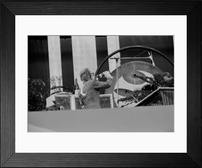 Framed Print : Elton John performing on stage at Wembley Stadium. London Framed Print : Elton John performing on stage at Wembley Stadium. London