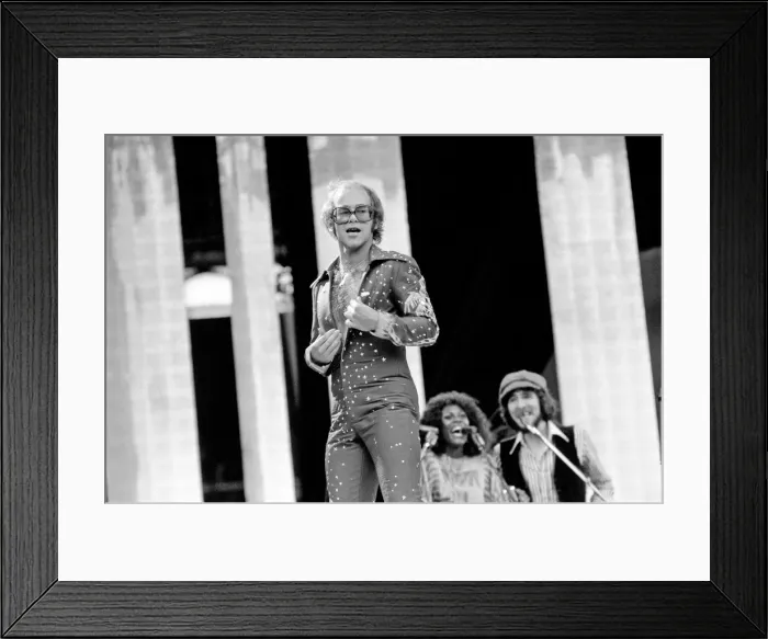 Framed Print : Elton John performing on stage at Wembley Stadium. London Framed Print : Elton John performing on stage at Wembley Stadium. London