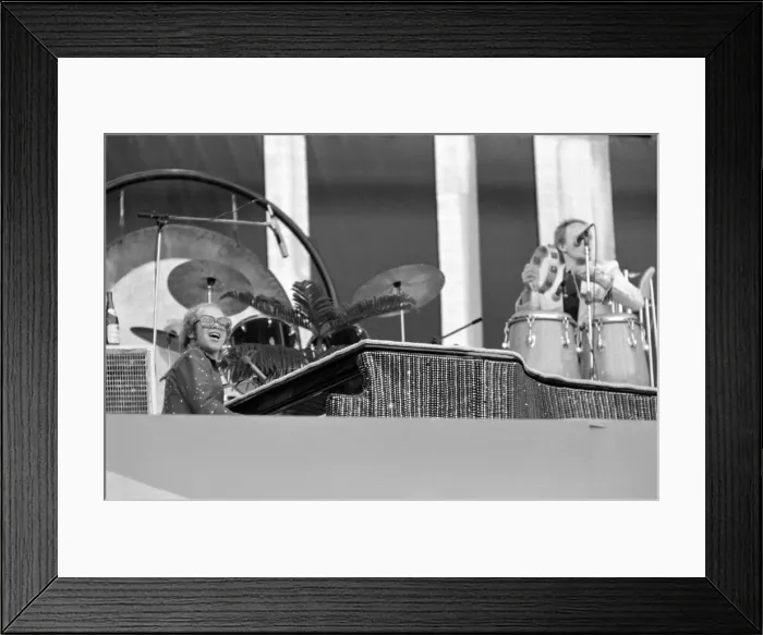 Framed Print : Elton John performing on stage at Wembley Stadium. London Framed Print : Elton John performing on stage at Wembley Stadium. London
