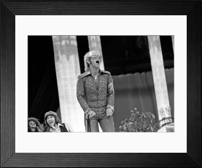 Framed Print : Elton John performing on stage at Wembley Stadium. London Framed Print : Elton John performing on stage at Wembley Stadium. London