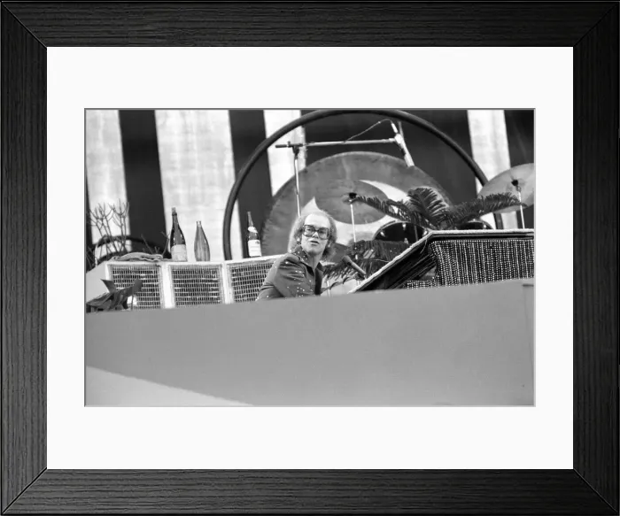Framed Print : Elton John performing on stage at Wembley Stadium. London Framed Print : Elton John performing on stage at Wembley Stadium. London
