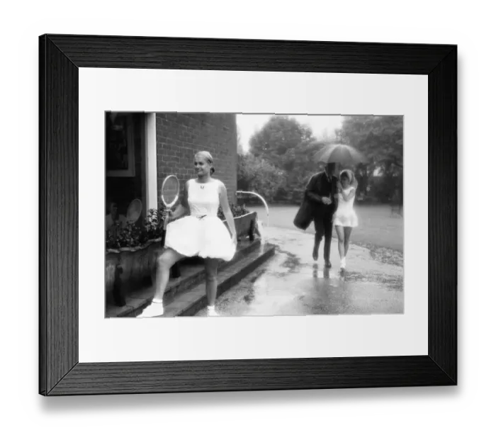 Framed Print : Lea Pericoli v Susanna Alexander at the rain soaked pre Wimbledon garden party Framed Print : Lea Pericoli v Susanna Alexander at the rain soaked pre Wimbledon garden party