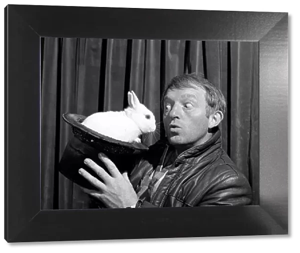 Paul Daniels with his pet rabbit Starsky. 27th November 1985