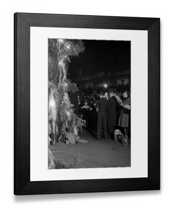 Framed Print : Carol singing around the Christmas Tree in Trafalgar Square, London Framed Print : Carol singing around the Christmas Tree in Trafalgar Square, London