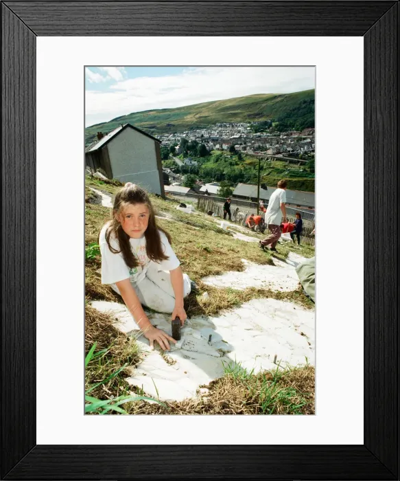 Framed Print : A huge Dragon made from recycled marble on the hillside in Blaenllechau Framed Print : A huge Dragon made from recycled marble on the hillside in Blaenllechau