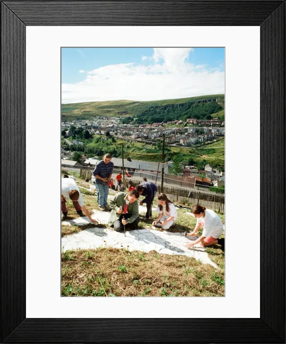 Framed Print : A huge Dragon made from recycled marble on the hillside in Blaenllechau Framed Print : A huge Dragon made from recycled marble on the hillside in Blaenllechau