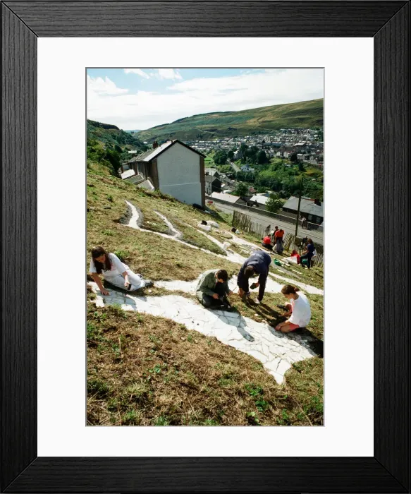 Framed Print : A huge Dragon made from recycled marble on the hillside in Blaenllechau Framed Print : A huge Dragon made from recycled marble on the hillside in Blaenllechau