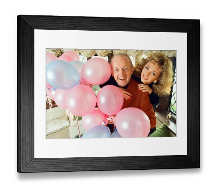 Framed Print : Magician Paul Daniels and his wife Debbie McGee pictured at home. 13th December 1991 Framed Print : Magician Paul Daniels and his wife Debbie McGee pictured at home. 13th December 1991