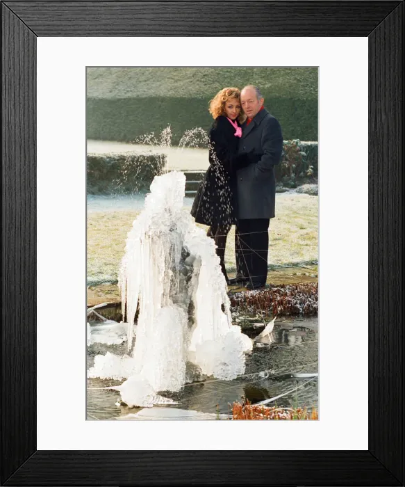 Framed Print : Magician Paul Daniels and his wife Debbie McGee pictured at home. 13th December 1991 Framed Print : Magician Paul Daniels and his wife Debbie McGee pictured at home. 13th December 1991