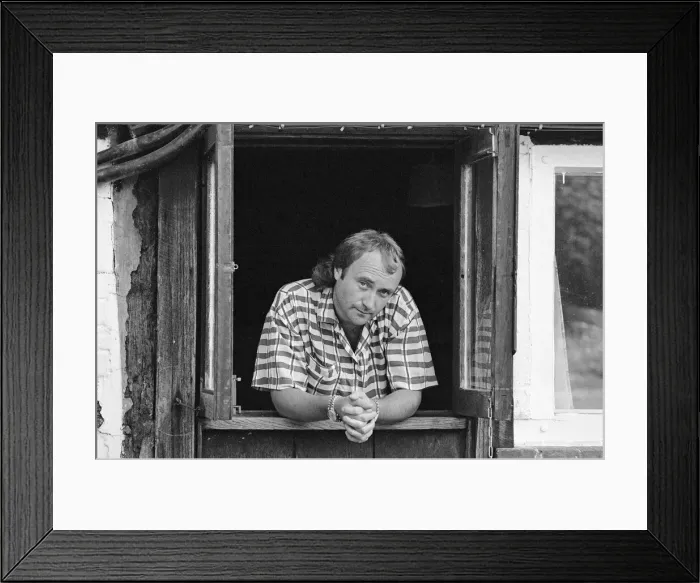Framed Print : Phil Collins at his studio in Surrey. 28th July 1985 Framed Print : Phil Collins at his studio in Surrey. 28th July 1985