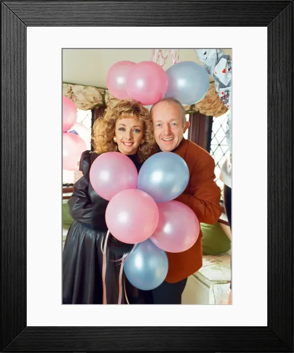 Framed Print : Magician Paul Daniels and his wife Debbie McGee pictured at home. 13th December 1991