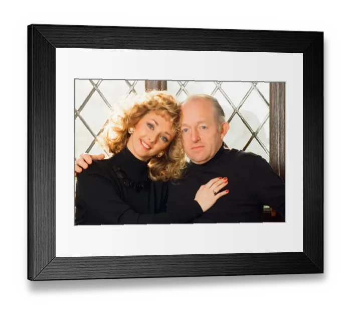 Framed Print : Magician Paul Daniels and his wife Debbie McGee pictured at home. 13th December 1991