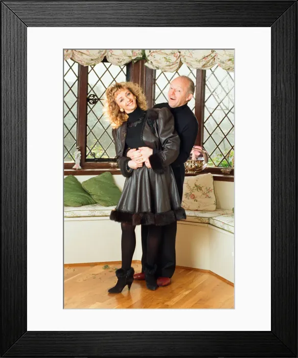 Framed Print : Magician Paul Daniels and his wife Debbie McGee pictured at home. 13th December 1991