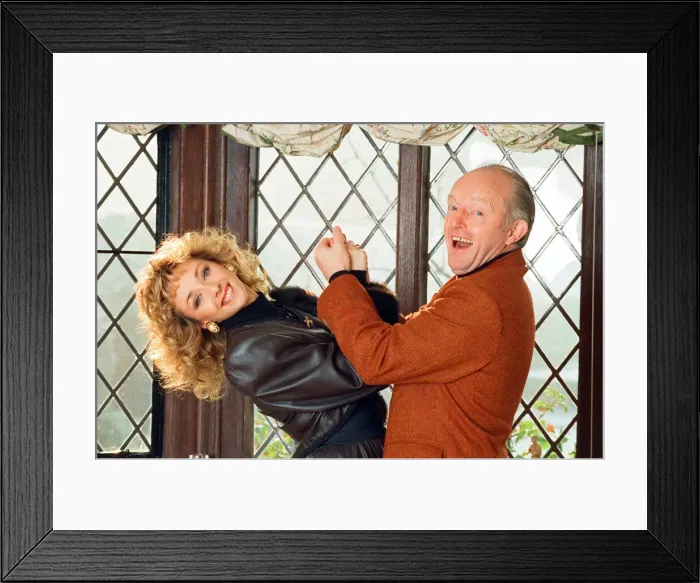Framed Print : Magician Paul Daniels and his wife Debbie McGee pictured at home. 13th December 1991 Framed Print : Magician Paul Daniels and his wife Debbie McGee pictured at home. 13th December 1991