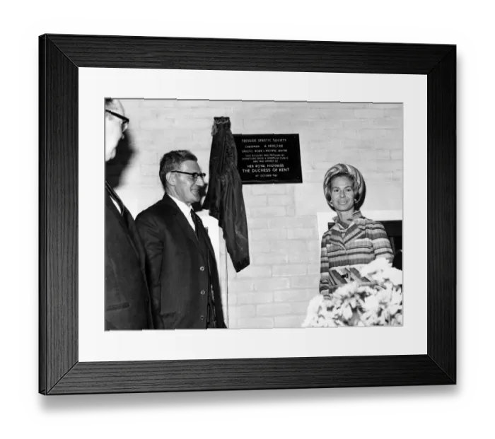 Framed Print : A plaque marking the big day for the spastics centre is unveiled by Katharine