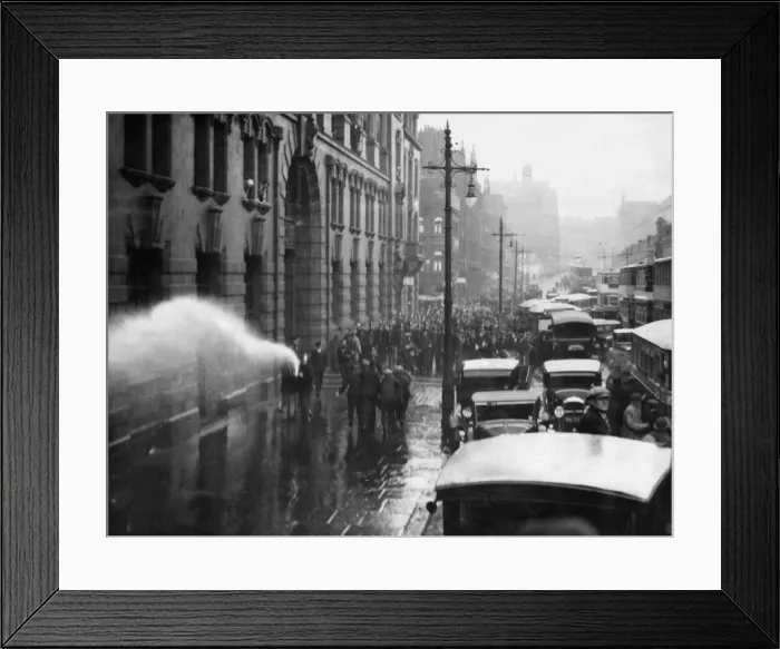 Framed Print : A scene of chaos and confusion as firemen turn the hose on a demonstration of unemployed Framed Print : A scene of chaos and confusion as firemen turn the hose on a demonstration of unemployed
