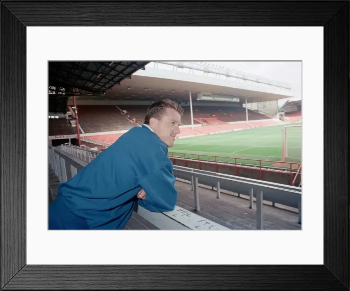 Framed Print : Liverpool football player Steve Nicol poses in the Kop stand at Anfield Stadium