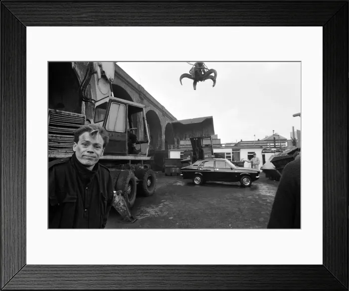 Framed Print : UB40 filming a video film in a scrapyard. The video film will feature songs from their Framed Print : UB40 filming a video film in a scrapyard. The video film will feature songs from their