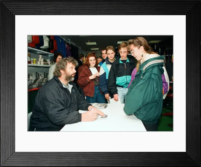 Framed Print : Geoff Capes signs copies of his book at Olympus in Reading. 23rd March 1991