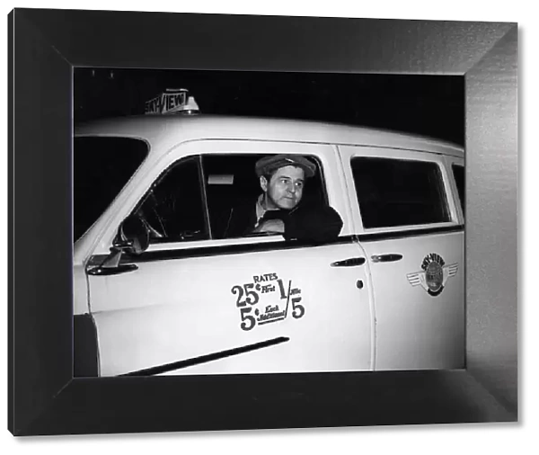 New York yellow taxi driver Michael Gandiosa. 18th November 1955