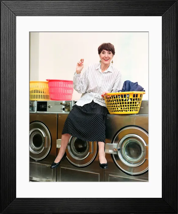 Framed Print : EastEnders star June Brown in a launderette. 6th February 1997 Framed Print : EastEnders star June Brown in a launderette. 6th February 1997