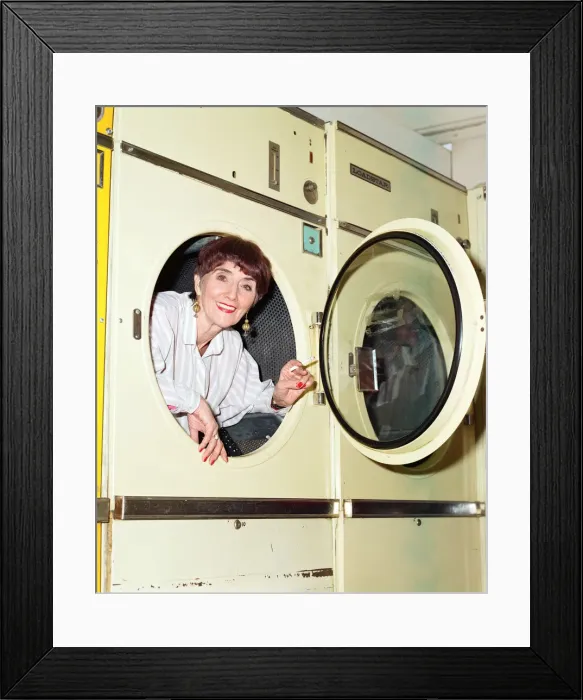 Framed Print : EastEnders star June Brown in a launderette. 6th February 1997 Framed Print : EastEnders star June Brown in a launderette. 6th February 1997