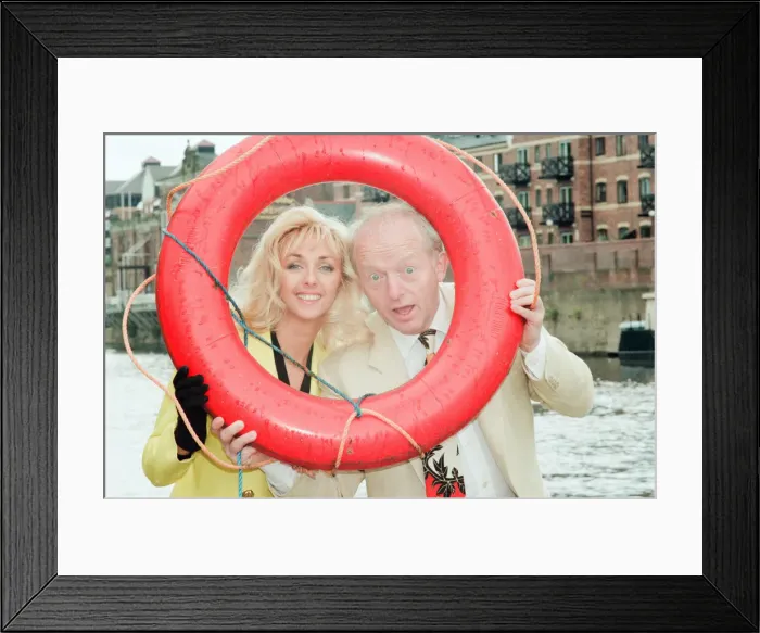 Framed Print : Paul Daniels, magician, pictured with wife Debbie McGee, at the riverside, in York Framed Print : Paul Daniels, magician, pictured with wife Debbie McGee, at the riverside, in York