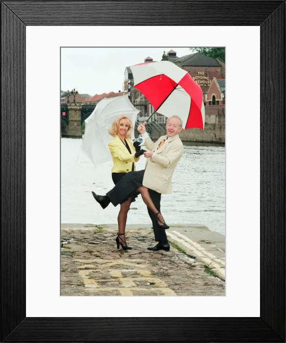 Framed Print : Paul Daniels, magician, pictured with wife Debbie McGee, at the riverside, in York