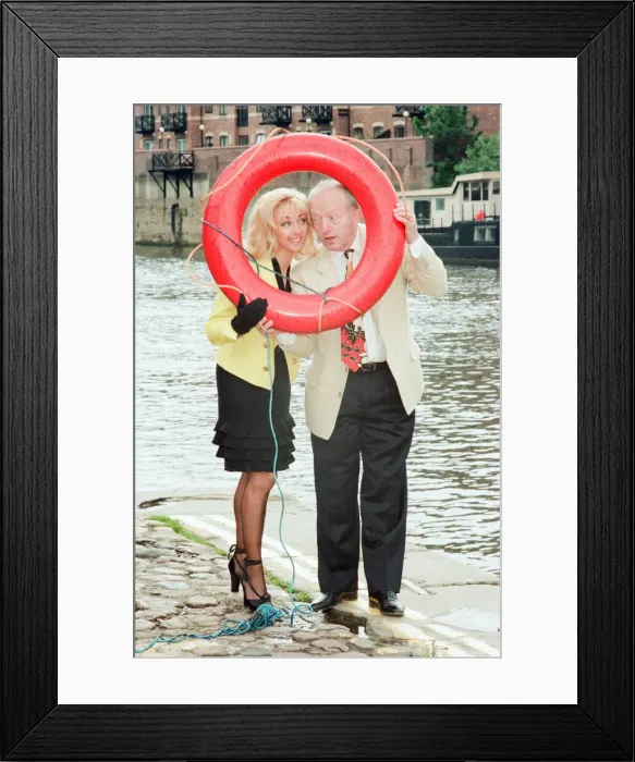 Framed Print : Paul Daniels, magician, pictured with wife Debbie McGee, at the riverside, in York