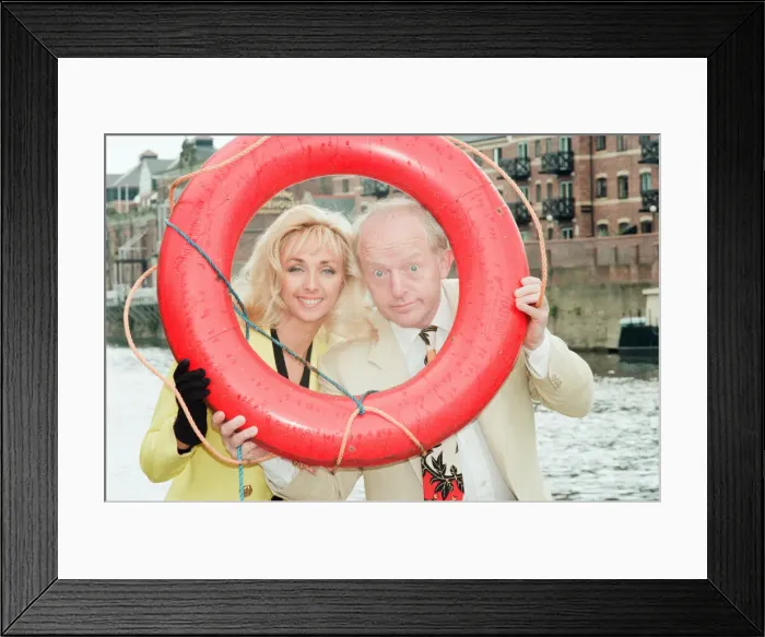 Framed Print : Paul Daniels, magician, pictured with wife Debbie McGee, at the riverside, in York