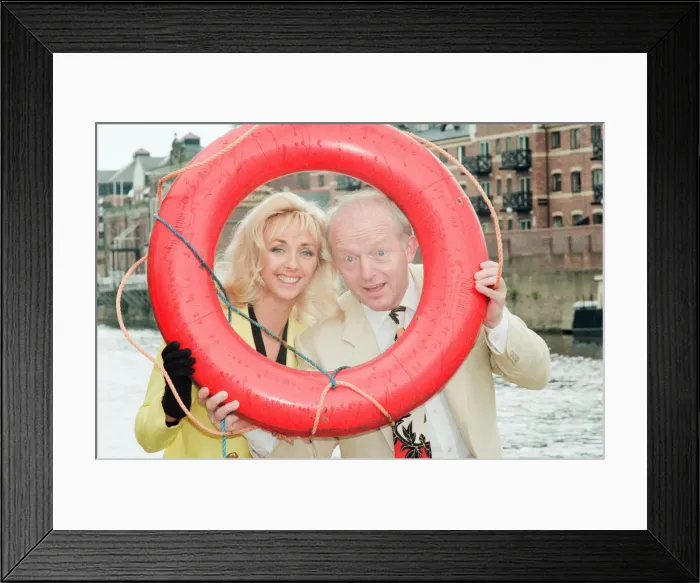 Framed Print : Paul Daniels, magician, pictured with wife Debbie McGee, at the riverside, in York Framed Print : Paul Daniels, magician, pictured with wife Debbie McGee, at the riverside, in York