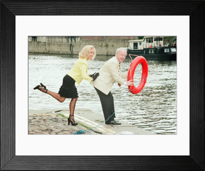 Framed Print : Paul Daniels, magician, pictured with wife Debbie McGee, at the riverside, in York Framed Print : Paul Daniels, magician, pictured with wife Debbie McGee, at the riverside, in York