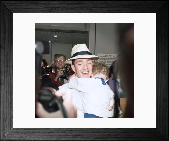 Framed Print : British cyclist Chris Boardman on arrival at Manchester airport as he returns home Framed Print : British cyclist Chris Boardman on arrival at Manchester airport as he returns home